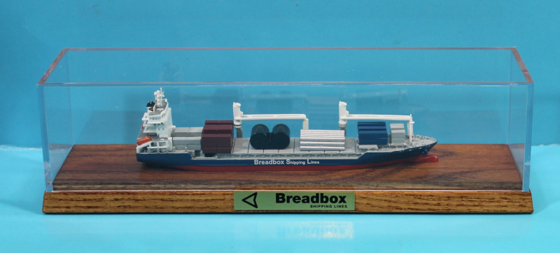 Container / heavy weight ship "Breadbox Shipping Lines" (1 p.) in showcase from Conrad 1:1000